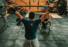 Why staff must take ownership of their own wellbeing People working out at a gym.