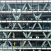 Office building facade with glass windows.