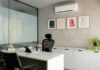 Climate advisers call for maximum workplace temperatures as UK heat risks grow An office with an air conditioner.