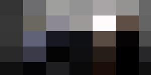 A group of nine Human Resources professionals standing confidently, dressed in formal suits and dresses against a gray background.