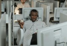 Employment Rights Act set to raise costs and curb hiring, CIPD warns People working in office cubicles.