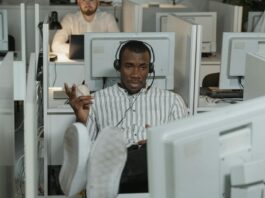 Employment Rights Act set to raise costs and curb hiring, CIPD warns People working in office cubicles.