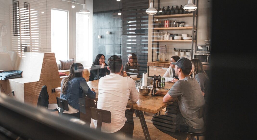 A group of people attending a meeting.