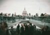 Vacancies rise but UK jobs market remains near five-year lows as salaries pass £44,000 People walking in London.