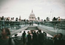 Vacancies rise but UK jobs market remains near five-year lows as salaries pass £44,000 People walking in London.