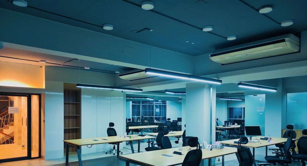 An office with desks and chairs.