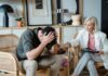 Mental health crisis could cost UK £170bn as workforce participation falls, report warns A supportive therapist provides comfort during a counseling session in a cozy office.