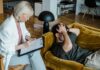 UK ‘passes 8 million mental health sick days’ as anxiety and burnout hit younger workers A therapist conducts a session with a client discussing mental health in a cozy office setting.