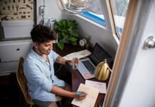 UK loses ground in global remote work rankings A man working at a desk in a home office.