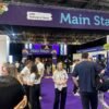 People walk around in front of the Main Stage area of the CIPD Festival of Work.