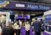 CIPD recognises 30 HR leaders driving change across UK workplaces People walk around in front of the Main Stage area of the CIPD Festival of Work.