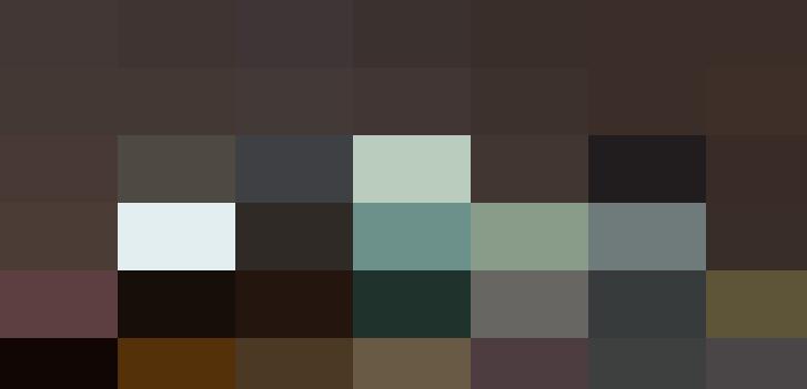 Night view of Canary Wharf skyline in London with illuminated HR office buildings reflected in water.