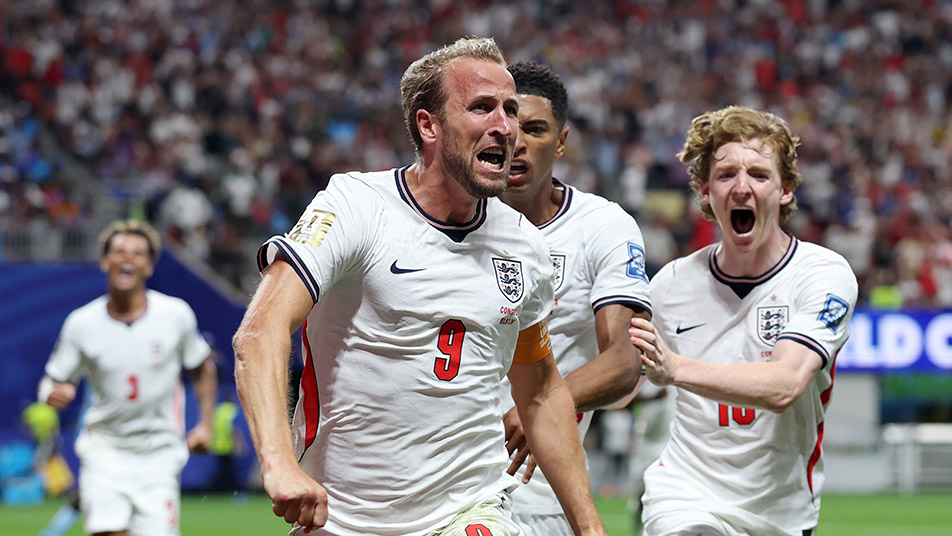 Harry Kane of England celebrates with teammates Jude Bellingham and Anthony Gordon after scoring his team's first goal during the FIFA World Cup 2026 Round of 32 match between England and Congo DR at Atlanta Stadium on July 1.