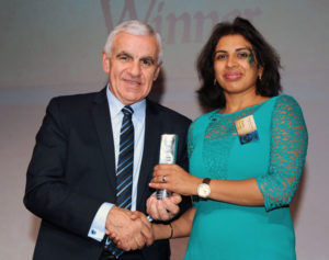 Meghana picks up her award for her excellent work as a diversity and inclusivity champion