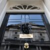 The front door of No 10 Downing Street as viewed from below.