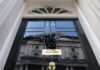 Employers await clarity on employment reforms after Starmer exit The front door of No 10 Downing Street as viewed from below.