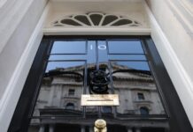 Employers await clarity on employment reforms after Starmer exit The front door of No 10 Downing Street as viewed from below.