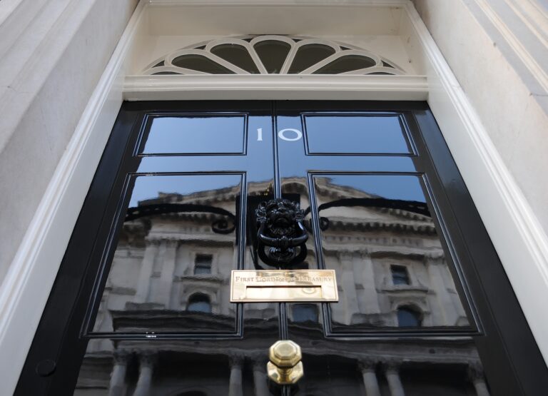 The front door of No 10 Downing Street as viewed from below.