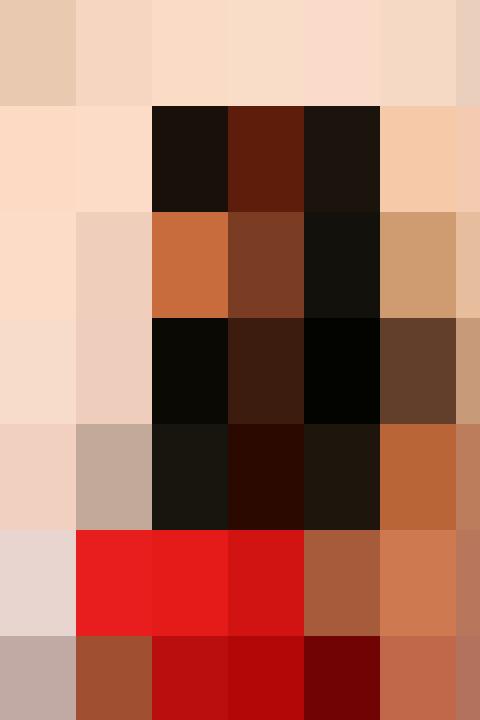 A woman in a red dress is smiling.