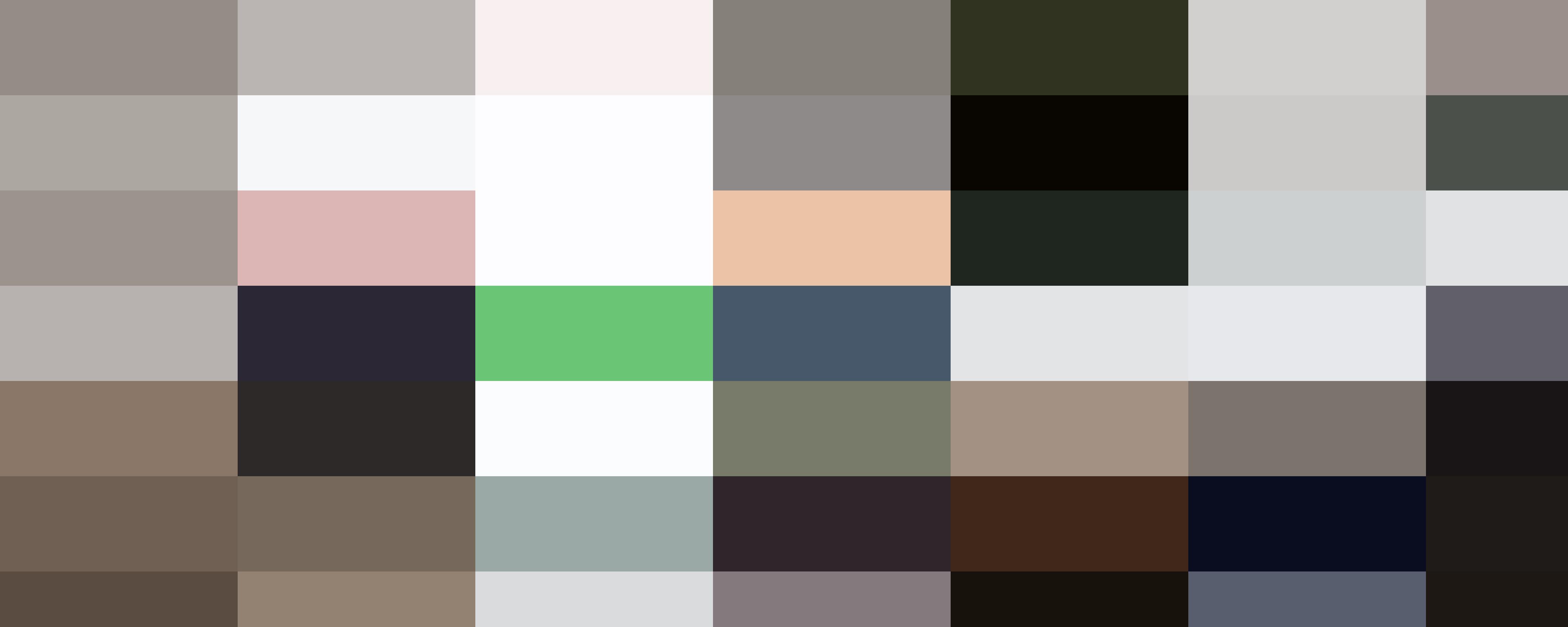 A person in a checkered shirt typing on a laptop at a wooden desk with a book, notebook, and a cup in the background, focused on HR tasks.