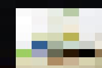 Two people engaging in human resources tasks on a couch with laptops.