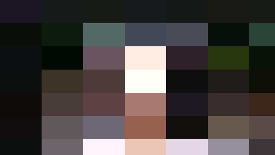 A person with curly hair, wearing a sweater, stands in front of a brick wall covered with green ivy, embodying the essence of HR and People Management.