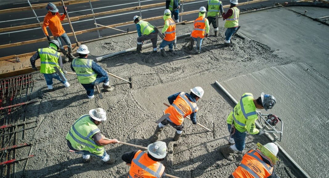 A group of workers at a construction site.
