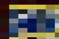 A person in a blue shirt and white hat with their arms raised in the air.