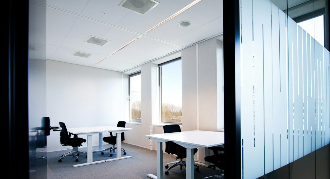 An office with empty chairs.