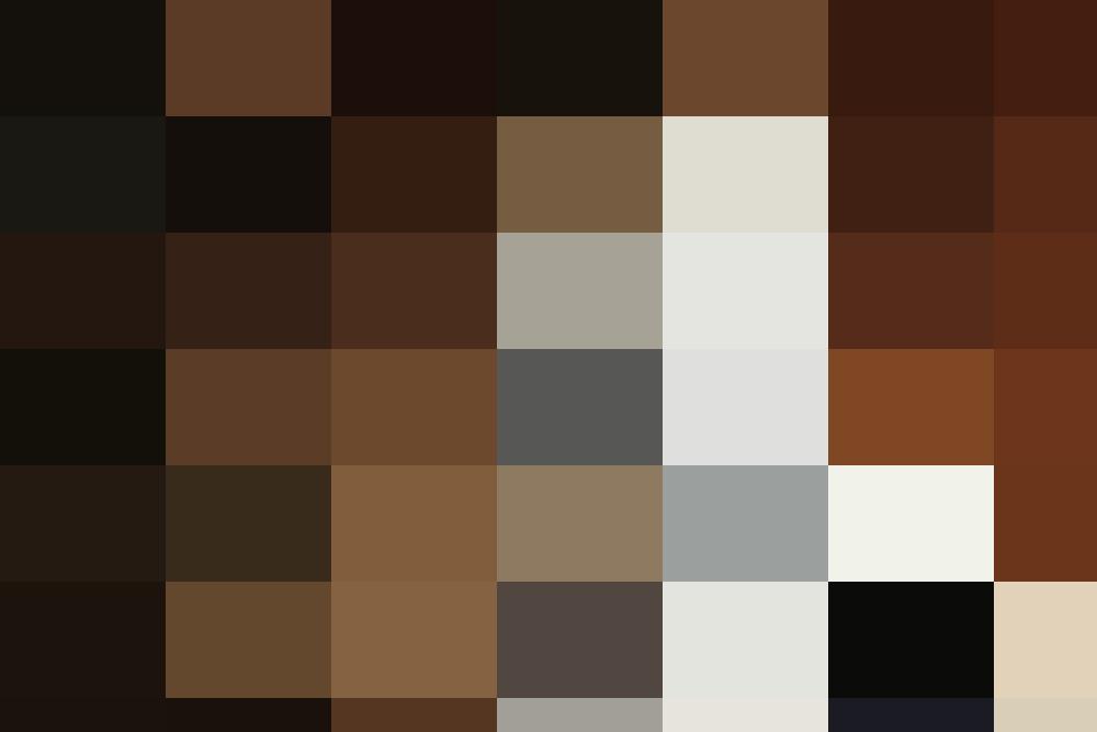 A white humanoid robot with round eyes and a friendly face is holding a tablet. The robot stands indoors next to a brick wall, exemplifying the future of job automation.