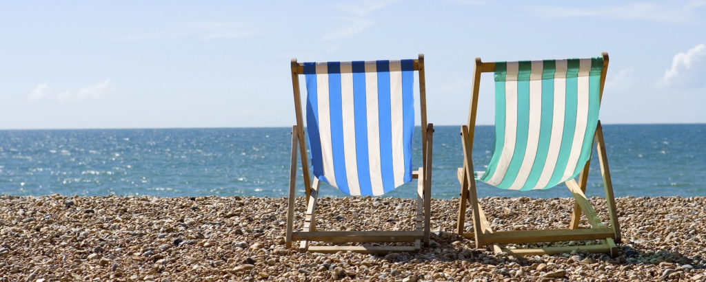 Deck chairs on Brighton beach