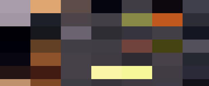 A graduation cap with colorful letters spelling 