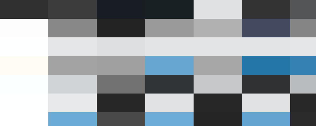 Rows of identical desktop computers with monitors, keyboards, and towers, all displaying blue screens, are neatly arranged on a white surface. It's a stark reminder of how essential HR systems are to efficient people management in today's digital workplace.