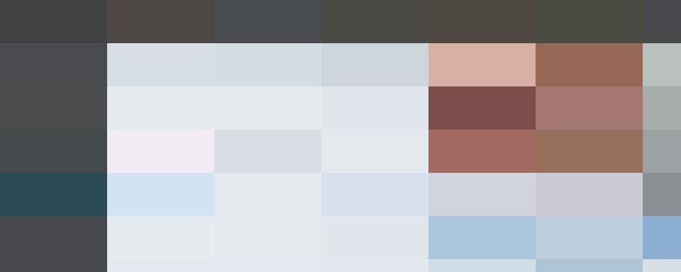 Close-up of a hand holding a pen, pointing at documents with various charts and graphs, indicating financial or HR data analysis.