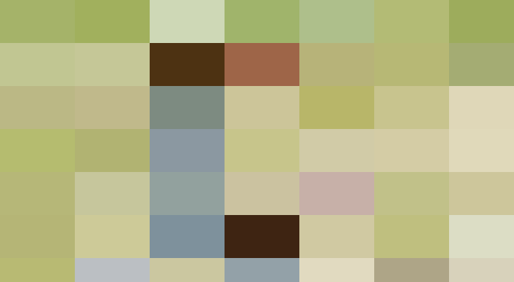 A male tennis player in white sportswear executing a backhand shot on a grass court.