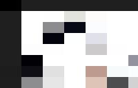 A person bending over with their hands on their knees.