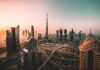 Middle East air disruption leaves UK staff stranded as employers weigh pay and absence decisions A view of downtown Dubai with towering skyscrapers.