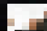 A woman in a business suit gracefully reclining on top of a glass, embodying the essence of Personnel Management.