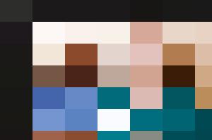 Two nurses representing equality and diversity in the hallway.