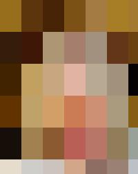 A woman with blonde hair managing people at a table in the Human Resources department.