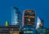 Private sector pay rises climb to 3.4 percent as cost of living pressure persists A view of the London City financial district at night.