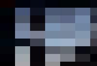 A silhouette of a coal mine at dusk, depicting the challenges of human resources and people management in the mining industry.