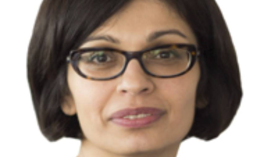 A person with short dark hair and glasses, wearing a neutral expression, against a plain background—an ideal image for personnel profiles in Human Resources.