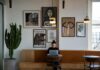 Businesses turn to freelancers as cost of permanent staff rises A woman works on a laptop in a cafe.