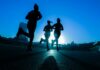 We are fuelling our own stress and diet and exercise are the way out Silhouette of three women running on a road.