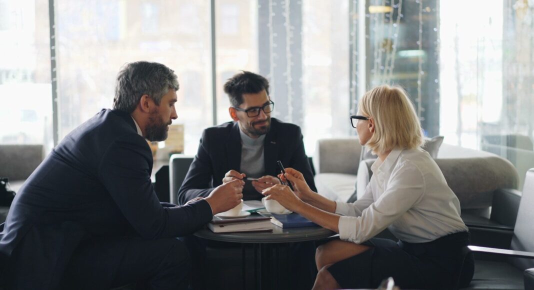 Business executives meeting around a table.
