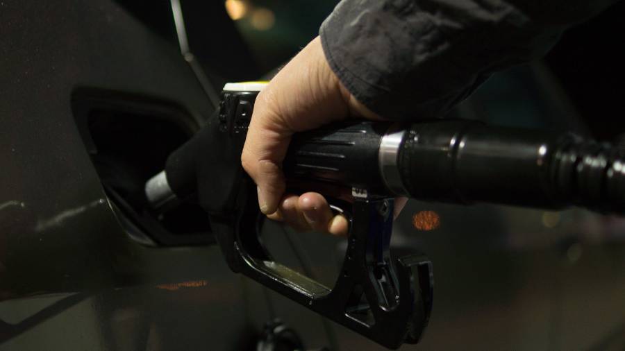 How should firms deal with staff who refuse to travel into work to save petrol?