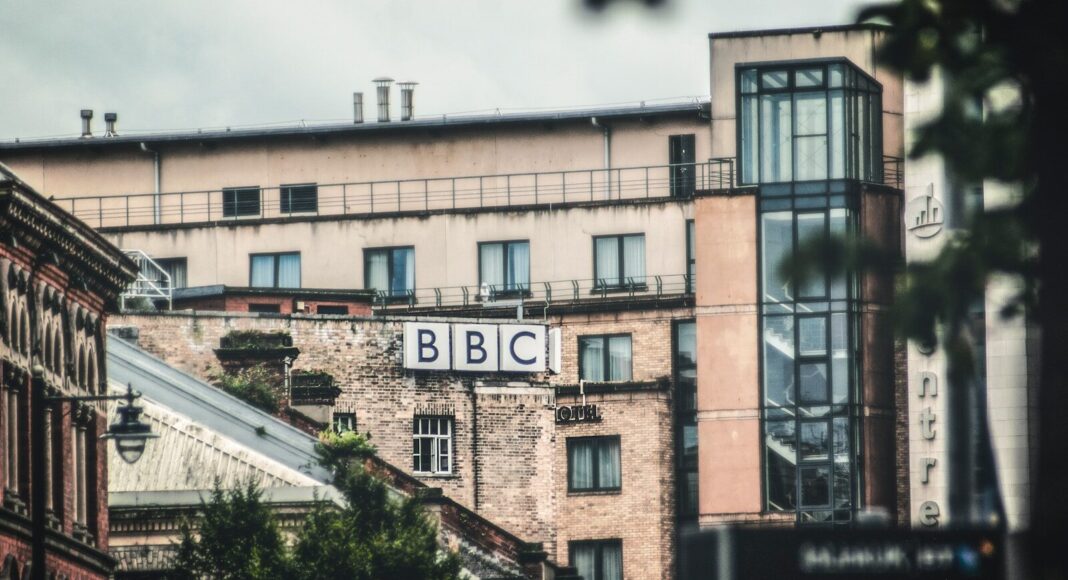 BBC logo on a building during daytime.