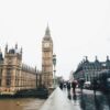 People walk near Big Ben in London.