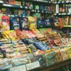 A shop display filled with lots of different types of snacks.